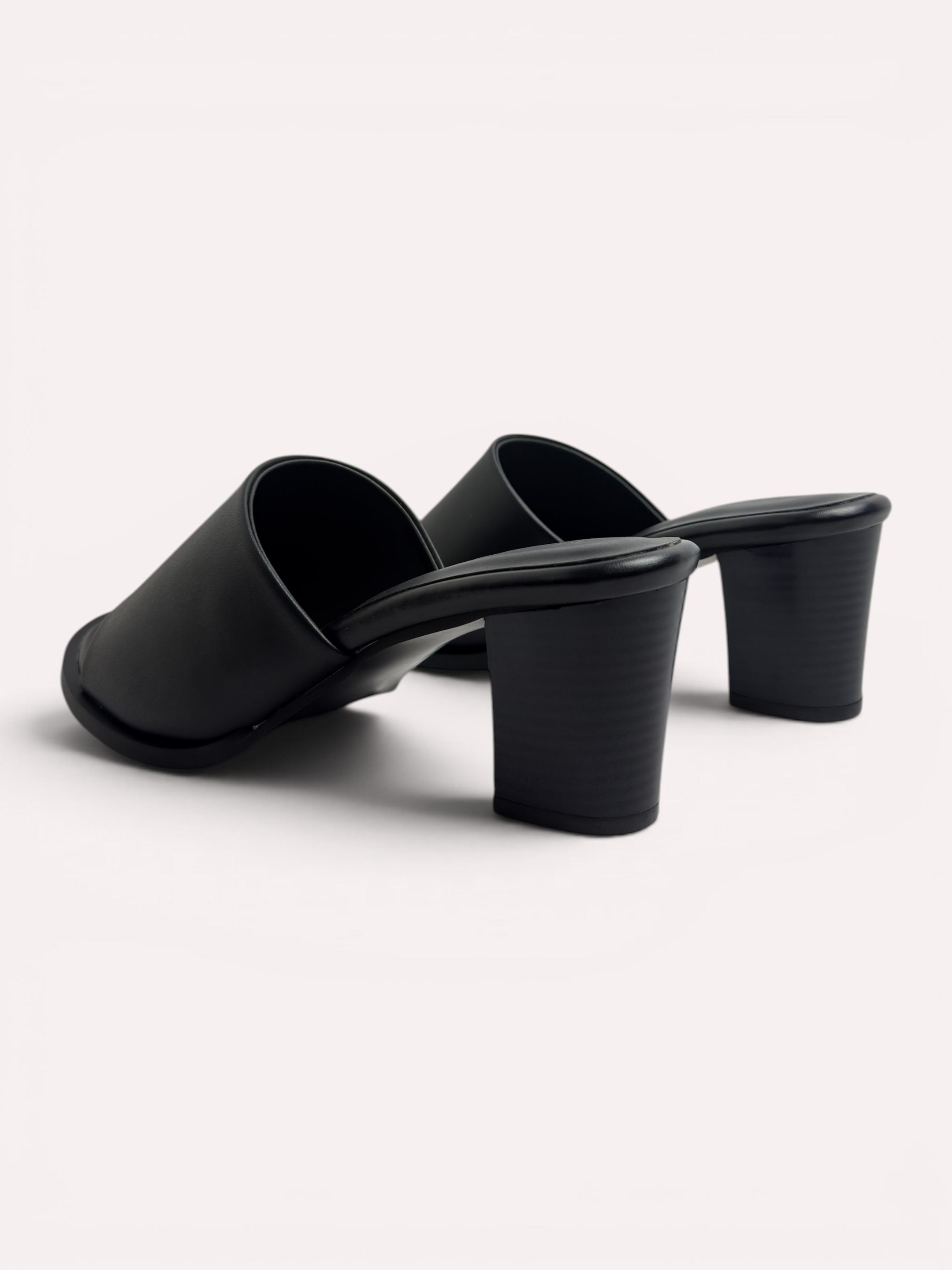 Cleo Sculptural Spiral Heel Mule – Black