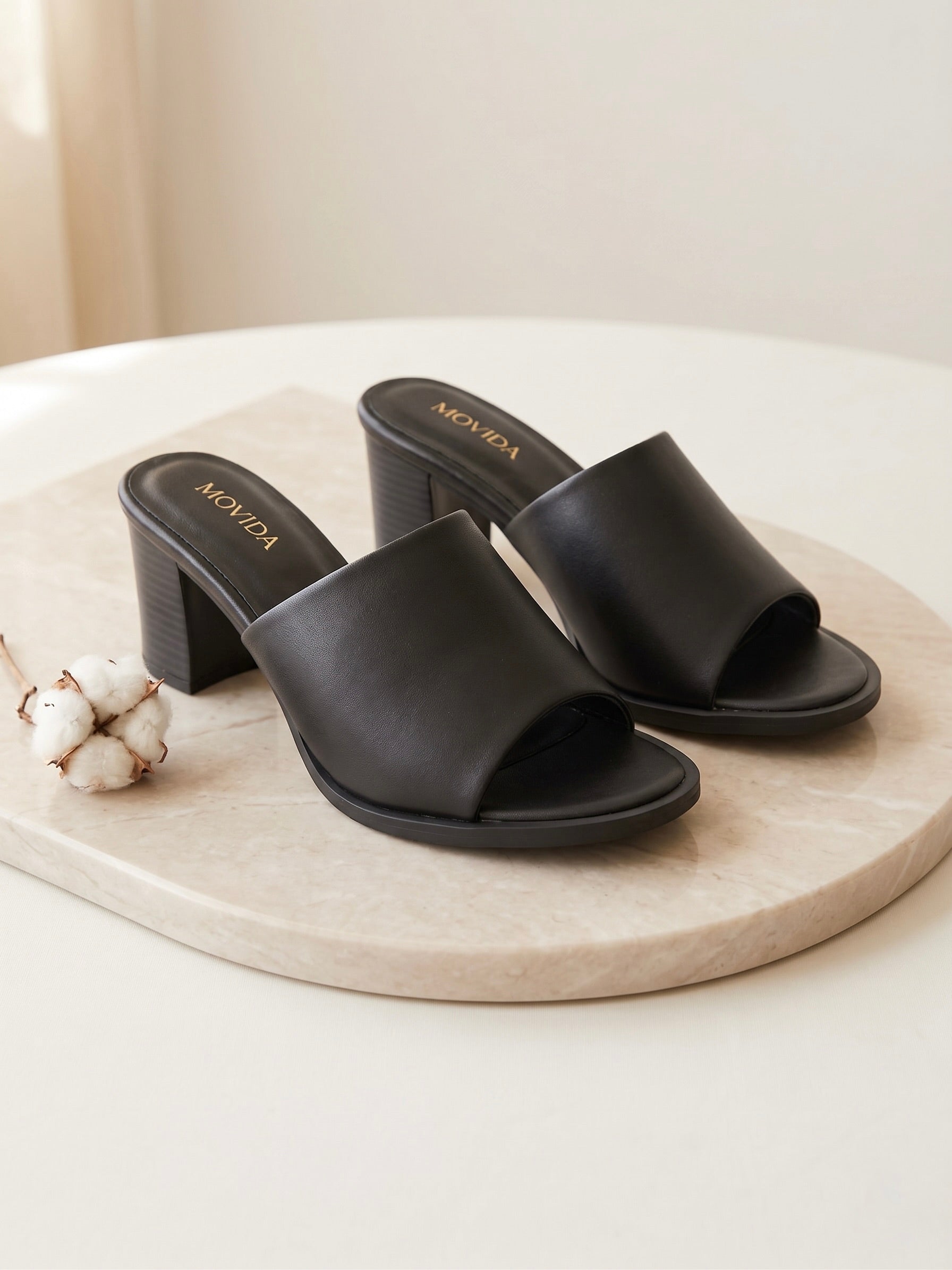 Cleo Sculptural Spiral Heel Mule – Black